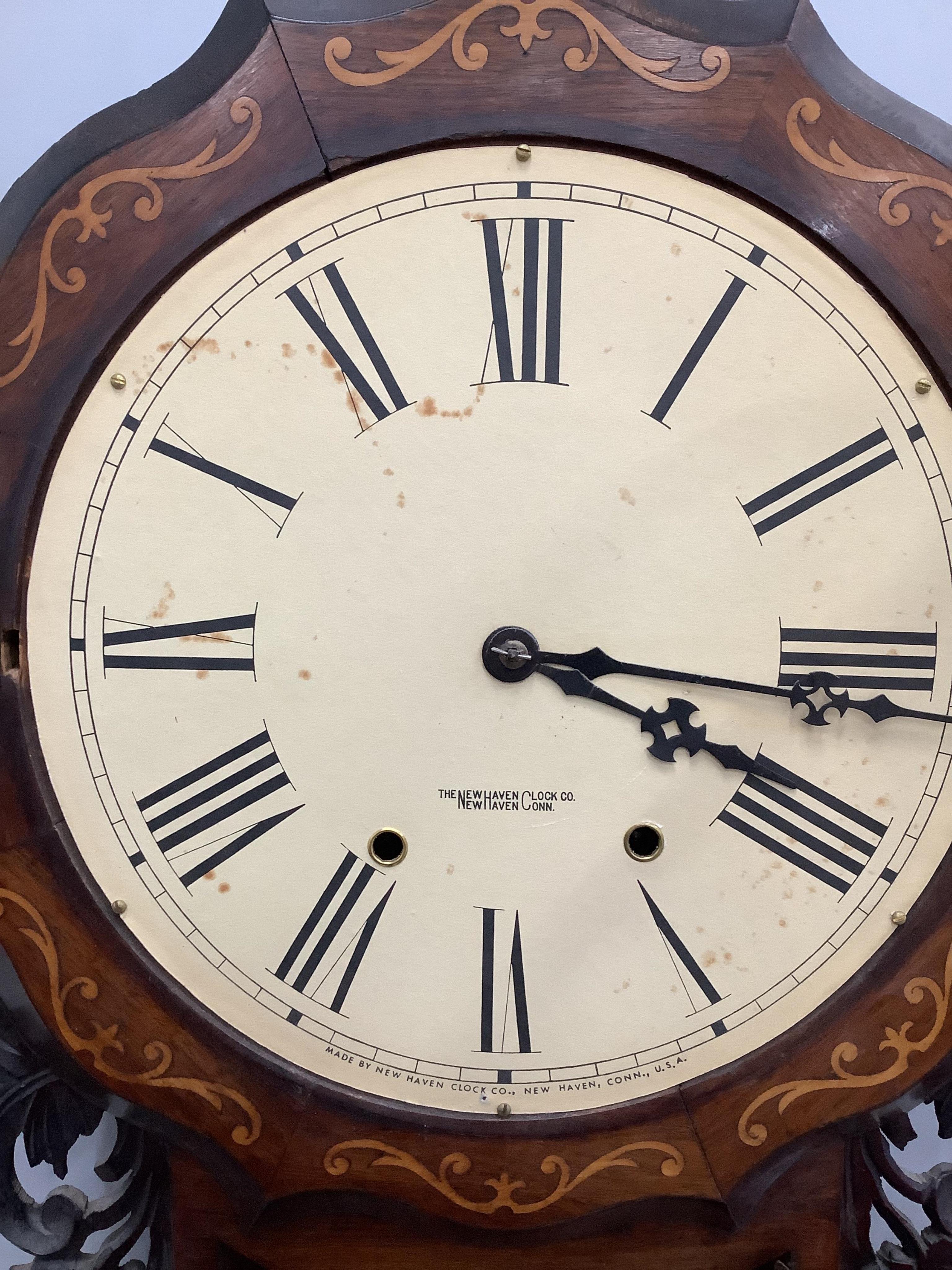 A late 19th century Newhaven Clock Company rosewood and marquetry inlaid drop dial wall timepiece, height 80cm. Condition - fair